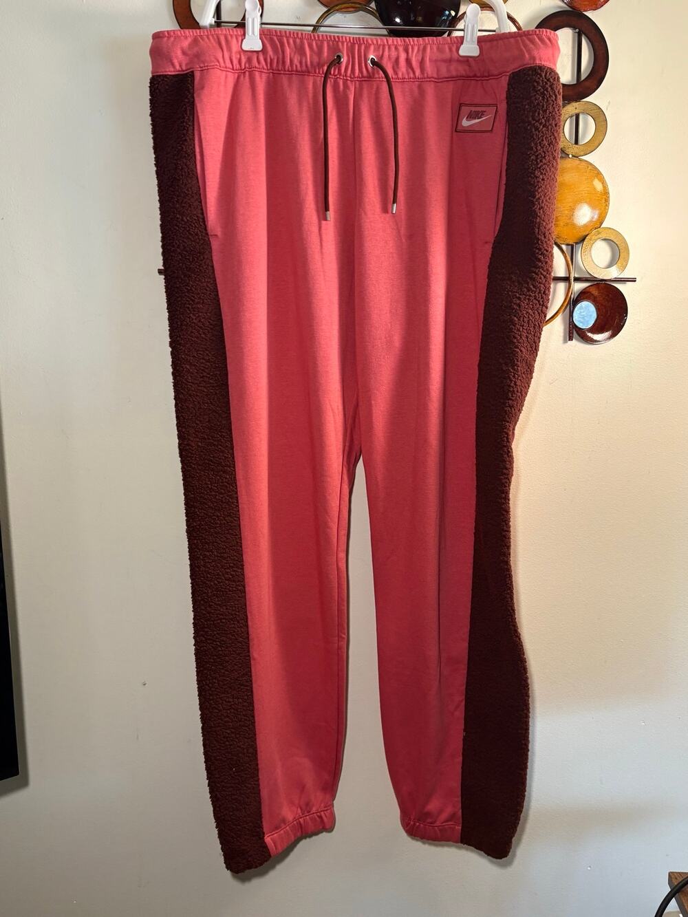 Women’s Nike xl pink and brown sweatpants.